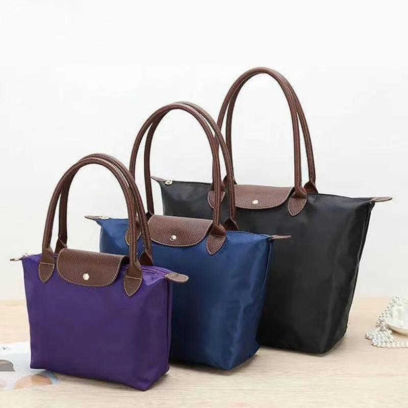 Women's Handbag with Elegant Handles and Spacious Interior